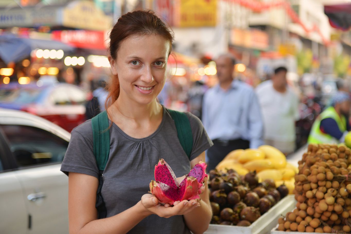 travelers exploring fruit markets in Southeast Asia
