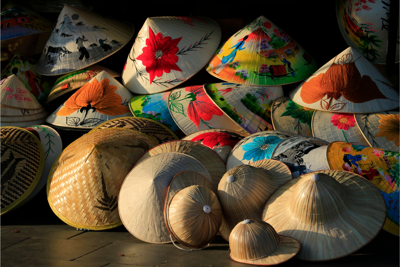 Traditional Vietnamese conical hats, a cultural experience for families with teenagers visiting Hue.