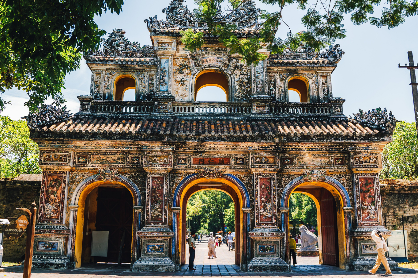 Imperial Citadel architecture in Hue visited by tourists